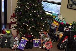 Kochek Donates Clothes & Goods for Giving Tree